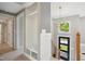 Entryway with built-in bench and staircase with modern railing at 313 Crown Oaks Dr, Raleigh, NC 27615