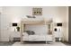 Bright bedroom featuring a modern bunk bed with a white ladder, complemented by neutral decor and stylish lighting at 320 Canyon Spring Trl, Wake Forest, NC 27587