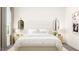 Serene main bedroom, showcasing bright windows, neutral accents and stylish mirrors and decor at 320 Canyon Spring Trl, Wake Forest, NC 27587