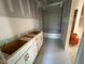 Bathroom featuring in progress vanity with sleek white cabinets at 348 Inspiration Way, Fuquay Varina, NC 27526