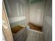 New bathroom featuring a tiled shower and in progress vanity installation at 348 Inspiration Way, Fuquay Varina, NC 27526