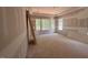 Bright bedroom featuring multiple windows offering great natural light and views of the surrounding landscape at 348 Inspiration Way, Fuquay Varina, NC 27526