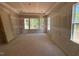 This spacious bedroom has a tray ceiling and lots of natural light from the windows at 348 Inspiration Way, Fuquay Varina, NC 27526