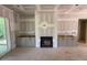 Living room features a fireplace at 348 Inspiration Way, Fuquay Varina, NC 27526