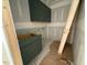 Room with in progress cabinets, new floor and materials stacked on floor at 348 Inspiration Way, Fuquay Varina, NC 27526