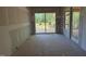 Sun room with a sliding glass door leading to a deck at 348 Inspiration Way, Fuquay Varina, NC 27526