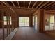 A sunroom under construction, with sliding glass doors providing access to the outside at 348 Inspiration Way, Fuquay Varina, NC 27526