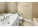 Cozy bathroom with tile floors, modern vanity, and a shower-tub combo for a comfortable experience at 3504 Crofton Ct, Raleigh, NC 27604