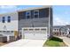 Spacious garage with ample parking, attached to a modern home in a well-kept neighborhood at 3715 Rosebush Dr, Zebulon, NC 27597