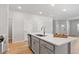 Spacious kitchen island with modern fixtures and plenty of counter space for meal preparation at 3715 Rosebush Dr, Zebulon, NC 27597