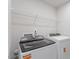 Convenient laundry room with modern washer and dryer units at 3715 Rosebush Dr, Zebulon, NC 27597