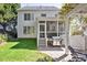 Exterior of home with a well-maintained yard, patio, and pergola at 402 Vatersay Dr, Apex, NC 27502
