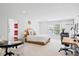 Bright bedroom with large window, neutral decor, and carpet flooring at 402 Vatersay Dr, Apex, NC 27502