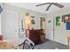 Cozy bedroom featuring natural light and a small desk area at 402 Vatersay Dr, Apex, NC 27502