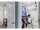 Walk-in closet featuring ample storage space and organized shelving at 402 Vatersay Dr, Apex, NC 27502