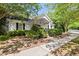 Charming building with lush landscaping and manicured hedges at 402 Vatersay Dr, Apex, NC 27502