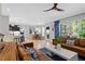 Spacious living area seamlessly connects to the kitchen and dining area, creating an open concept home at 402 Vatersay Dr, Apex, NC 27502