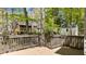 Large back deck overlooking a spacious yard and mature trees at 4936 Liverpool Ln, Raleigh, NC 27604
