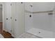 Bathroom showcasing a walk-in shower with subway tile and matte black hardware at 4936 Liverpool Ln, Raleigh, NC 27604