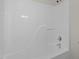 A clean, white shower stall featuring chrome fixtures at 4936 Liverpool Ln, Raleigh, NC 27604