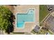 Aerial view of a pool with lane markers surrounded by a deck and landscaping at 4936 Liverpool Ln, Raleigh, NC 27604