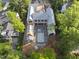 Aerial view of home under construction, framing the foundation for a luxurious pool in a serene, wooded location at 516 Transylvania Ave, Raleigh, NC 27609