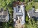 Birds eye view showing the layout of a home under construction, neighboring houses and mature tree coverage at 516 Transylvania Ave, Raleigh, NC 27609