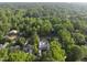 Overhead shot shows a new construction property, with trees dotting the landscape in the background at 516 Transylvania Ave, Raleigh, NC 27609