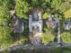 A high-angle view displays new construction in a lovely neighborhood setting, surrounded by lush greenery at 516 Transylvania Ave, Raleigh, NC 27609