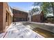 Spacious backyard features a home under construction with a large in-ground pool at 516 Transylvania Ave, Raleigh, NC 27609