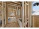 Under-construction bathroom showcasing wood framing, a modern bathtub, and initial plumbing, highlighting the development process at 516 Transylvania Ave, Raleigh, NC 27609