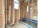Partially framed bathroom showing the initial plumbing setup at 516 Transylvania Ave, Raleigh, NC 27609