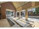 View of home under construction, showcasing brickwork, wood framing, and a future pool area at 516 Transylvania Ave, Raleigh, NC 27609