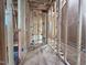 Framed hallway of a home highlighting the exposed pipes and electrical wiring at 516 Transylvania Ave, Raleigh, NC 27609