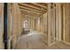 The interior is under construction with exposed framing and temporary flooring at 516 Transylvania Ave, Raleigh, NC 27609