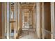 Under-construction interior featuring wood framing, visible plumbing, and electrical wiring, showcasing the building's initial stages at 516 Transylvania Ave, Raleigh, NC 27609