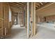 Spacious interior view of the new home featuring exposed framing and modern building materials at 516 Transylvania Ave, Raleigh, NC 27609