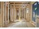 The interior is under construction with exposed framing and temporary flooring at 516 Transylvania Ave, Raleigh, NC 27609