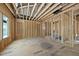 Partially framed area with exposed ceiling and wall studs, awaiting finishing touches and design input at 516 Transylvania Ave, Raleigh, NC 27609