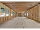 Large area with exposed wood framing, offering potential for customization and design flexibility at 516 Transylvania Ave, Raleigh, NC 27609