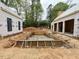 The pool construction in progress features a rebar framework at 516 Transylvania Ave, Raleigh, NC 27609