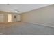 Spacious carpeted room features a ceiling fan with access to the bathroom at 5329 Big Bass Dr, Raleigh, NC 27610
