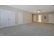 Large carpeted bonus room offering multiple closets and an open layout at 5329 Big Bass Dr, Raleigh, NC 27610