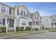Attractive townhome featuring a classic facade, well-maintained lawns, and inviting front entries at 5329 Big Bass Dr, Raleigh, NC 27610