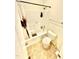 Bright bathroom featuring a shower-tub combo, neutral tile flooring, and updated fixtures at 5410 Jessip Street St, Morrisville, NC 27560