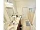 Bright bathroom featuring double sinks, a large mirror, and a shower with a glass door at 5410 Jessip Street St, Morrisville, NC 27560