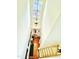 Bright two-story foyer with hardwood floors, chandelier, and staircase to upper level at 5410 Jessip Street St, Morrisville, NC 27560