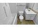 Clean bathroom features a shower/tub combo, toilet, and single sink vanity at 5600 Brandycrest Dr, Raleigh, NC 27610