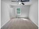 Bright bedroom with neutral carpet and walls and a ceiling fan at 5600 Brandycrest Dr, Raleigh, NC 27610