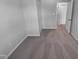 Bright bedroom with carpet, and white doors, freshly painted at 5600 Brandycrest Dr, Raleigh, NC 27610